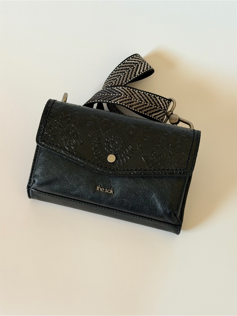 The Sak Redwood Smartphone Crossbody Bag Leather Black Floral Embossed